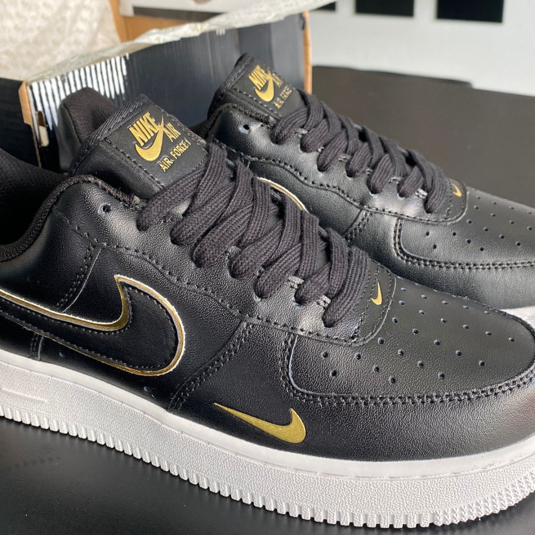 Gold black air force sales ones